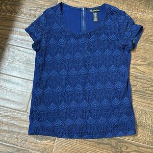 Blue large Signature Studio crochet look top. Back is solid.